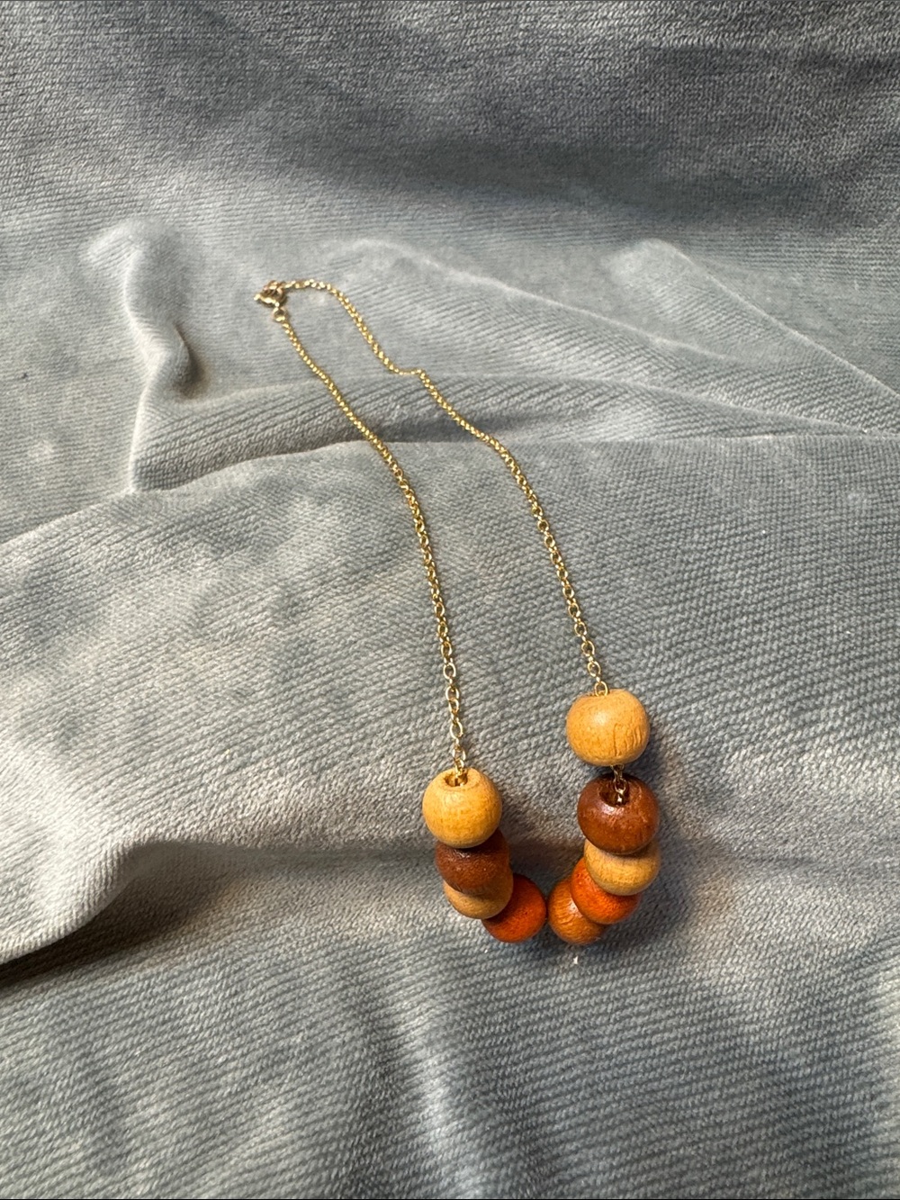 Gold-Tone Necklace with Warm Wooden Beads